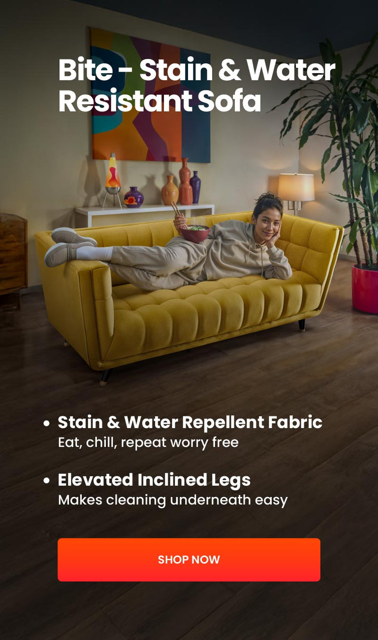 Woman lying on a yellow sofa with text about stain and water resistance, elevated inclined legs, and a 'Shop Now' button.