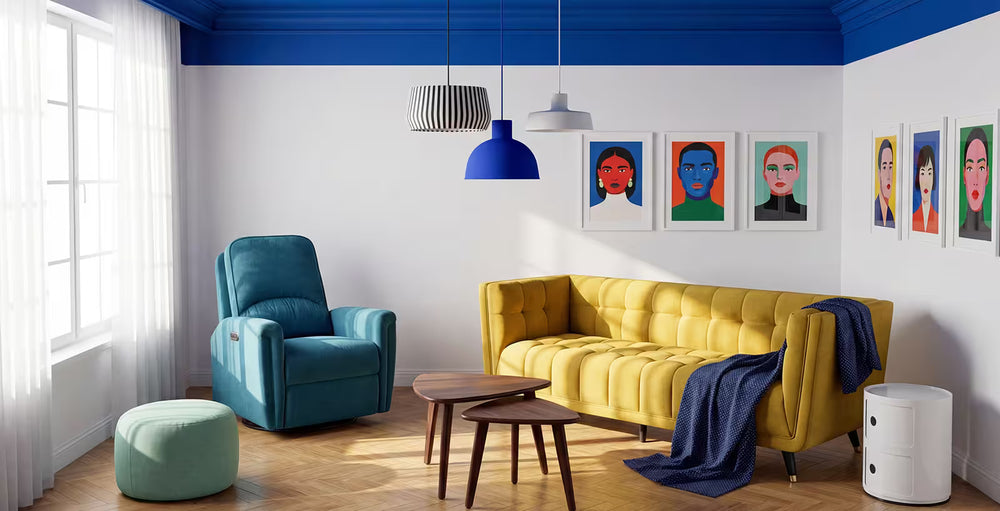Modern living room with a yellow sofa, blue armchair, and colorful wall art.